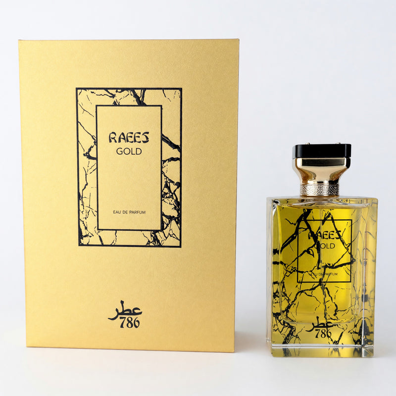 Jo Milano Raees Gold 3.4 oz men's EDP bottle with gold accents and elegant packaging.