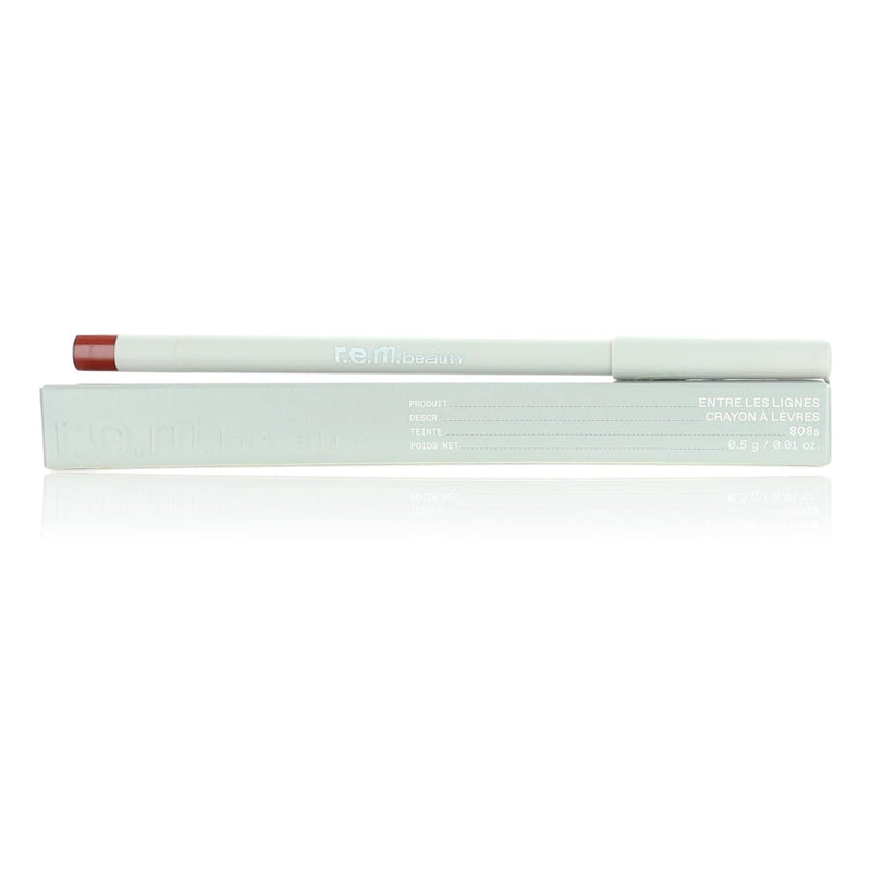 r.e.m. beauty At the Borderline Lip Liner Pencil in shade 808s, small physical makeup product with a sleek design.