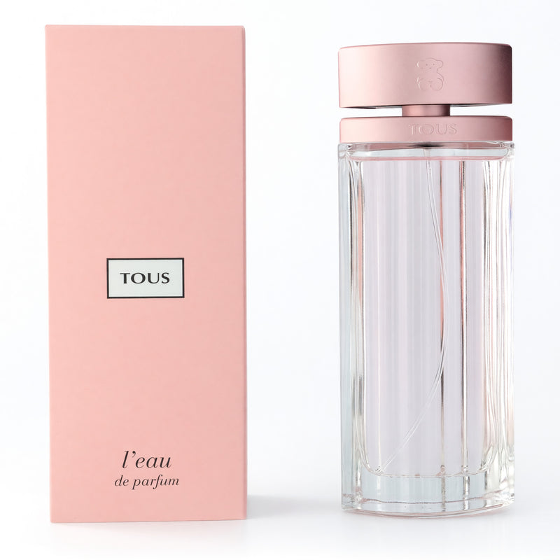 Tous L'eau by Tous 3 oz women’s Eau de Parfum spray bottle with elegant packaging.