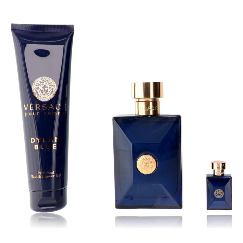 Versace Dylan Blue 3-piece gift set for men, includes fragrance bottle, shower gel, and after-shave balm, all with distinctive branding.