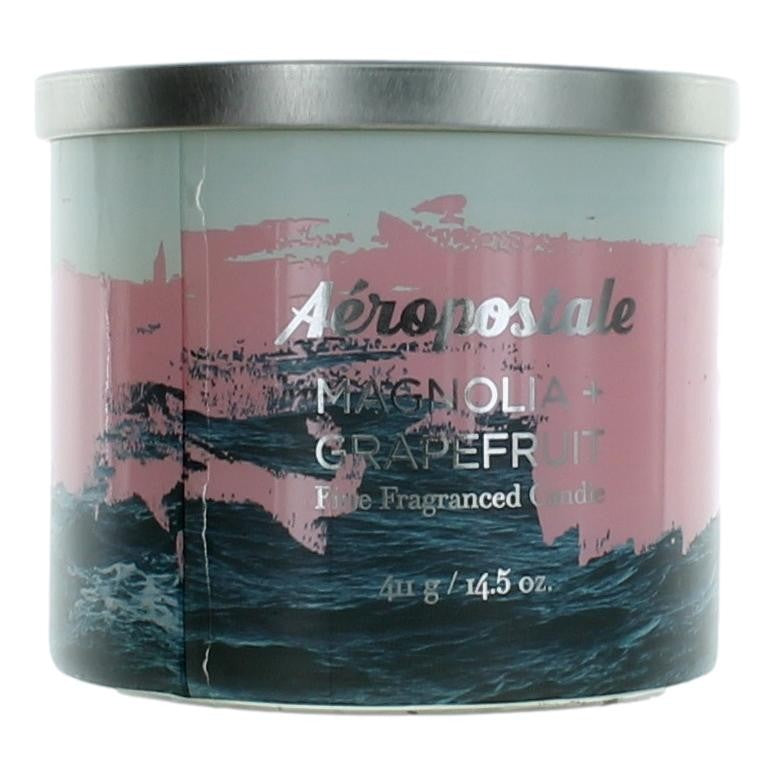 Aeropostale 14.5oz soy wax blend 3-wick candle with magnolia and grapefruit scent, featuring a decorative lid and clear glass jar.