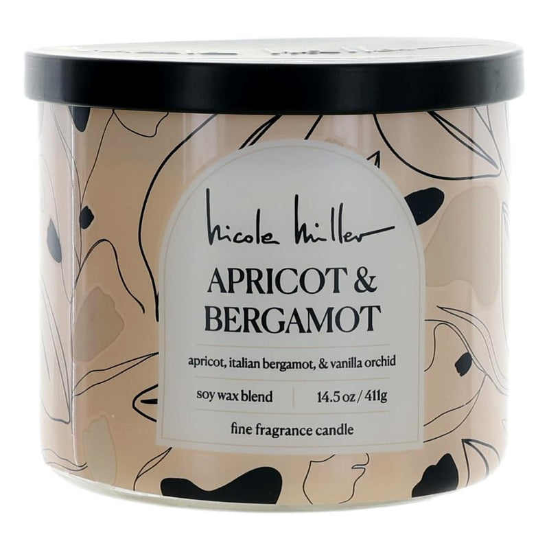 Nicole Miller 14.5 oz soy wax blend three-wick candle with apricot and bergamot scent, displayed in a glass jar.