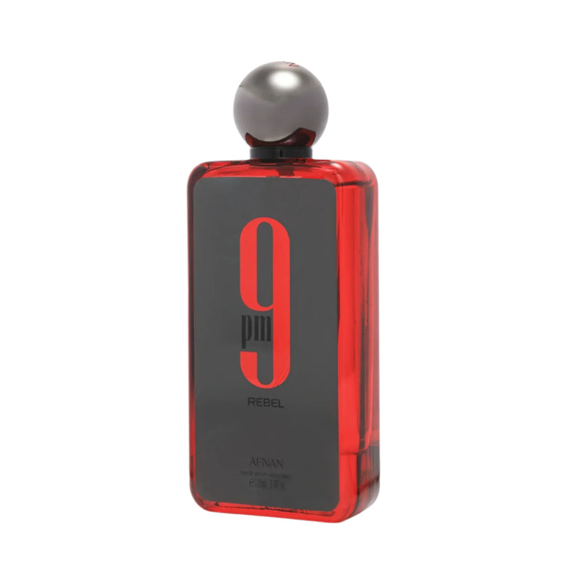 A 3.4 oz bottle of Afnan 9 PM Rebel perfume by Pertinacia Perfume, with sleek packaging and label visible.