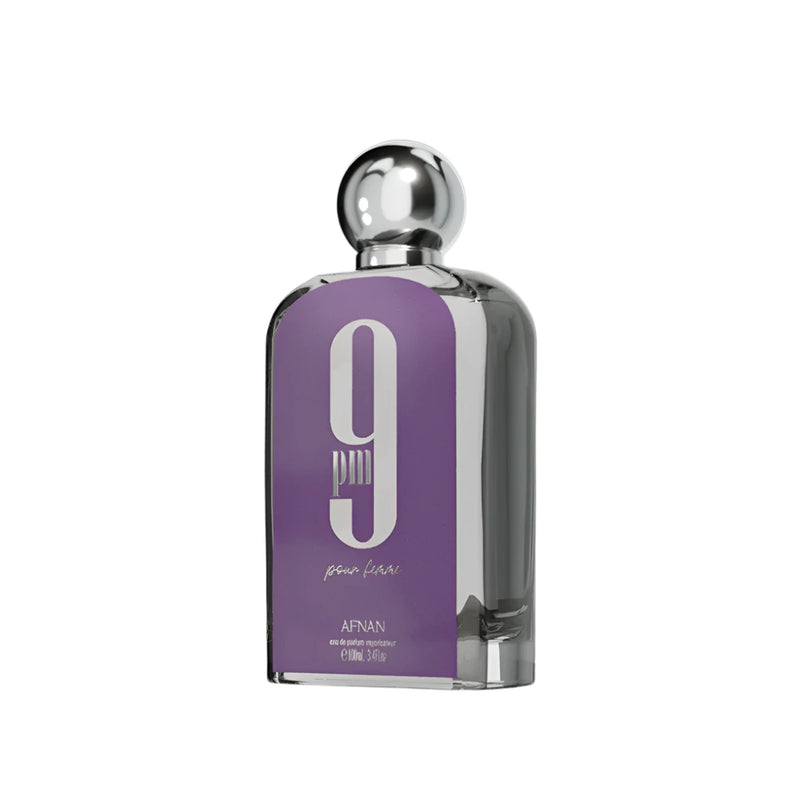 A 3.4 oz bottle of 9 PM Pour Femme by Afnan perfume from Pertinacia Perfume, featuring elegant packaging and clear branding.