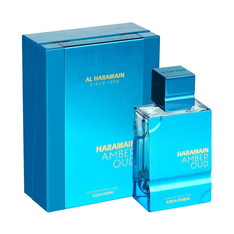 Al Haramain Amber Oud Aqua Dubai perfume bottle, 2.5 oz, with elegant packaging and amber-colored fragrance liquid.