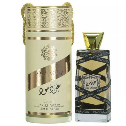 Lattafa Oud Mood Eau De Parfum 3.4 oz bottle, elegant fragrance with warm, woody notes, displayed in a sleek perfume bottle.