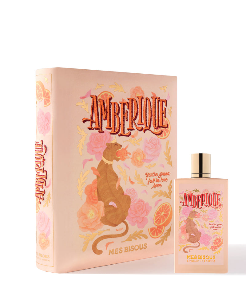 Amberique Mes Bisous Extrait perfume by Pertinacia LLC, 3.4oz bottle with elegant floral and amber fragrance details.
