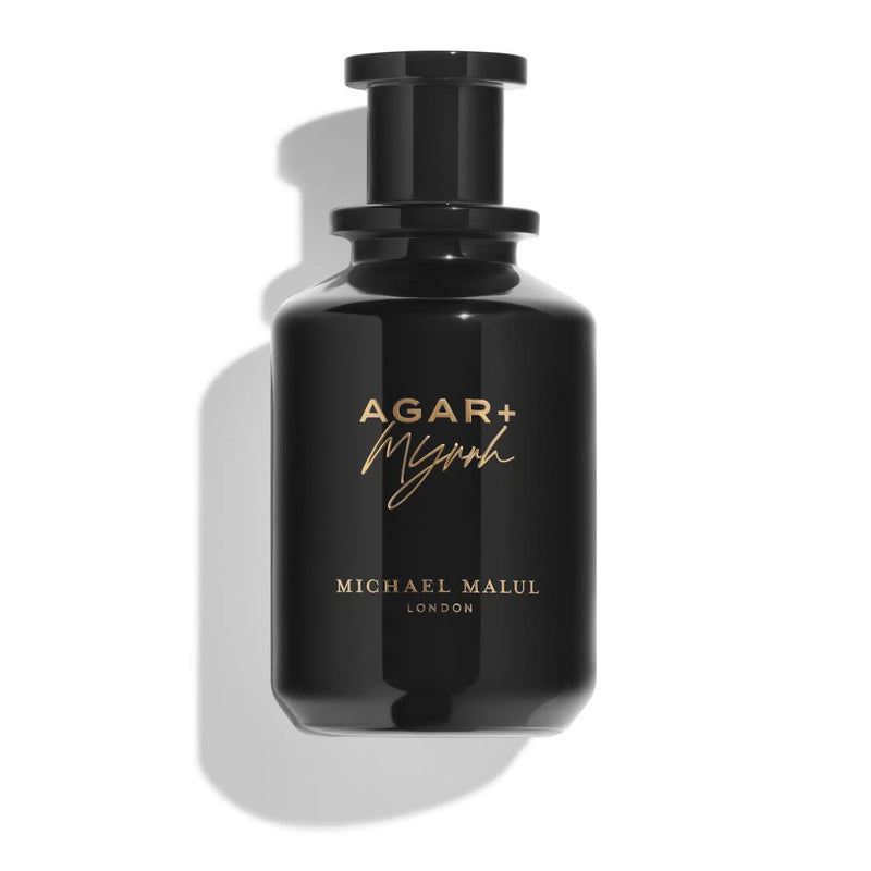 Michael Malul Agar + Myrrh 3.4oz EDP perfume bottle by Pertinacia Perfume, featuring a sleek glass design with a silver cap.