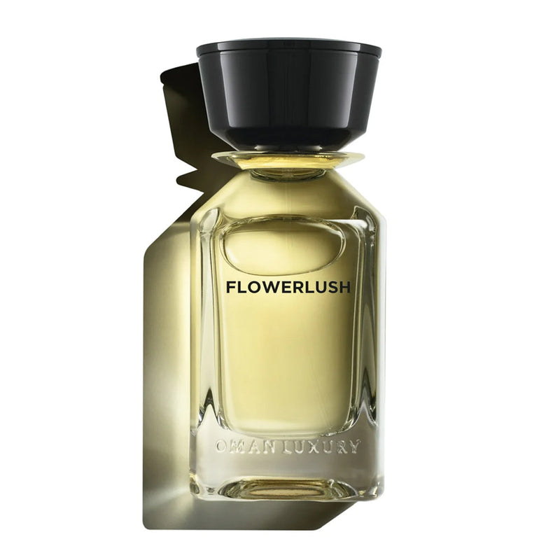 Flowerlush Omanluxury perfume bottle, 3.4 oz, with elegant floral design and clear glass highlighting the luxurious fragrance.