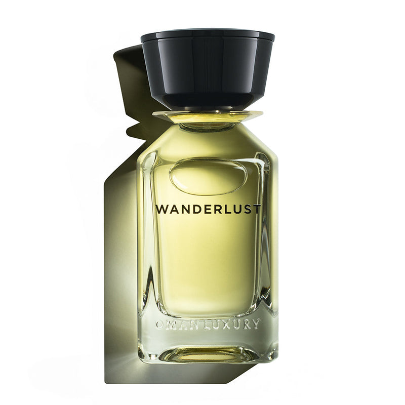 Luxury Wanderlust Oman perfume bottle by Online Warehouse, 3.4 oz, with elegant design and clear branding visible.