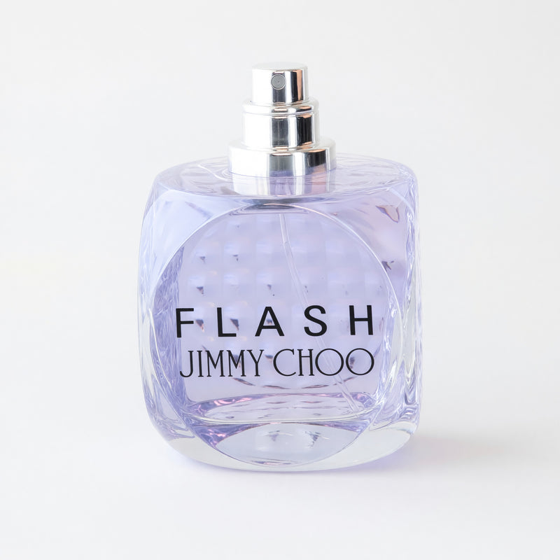 Jimmy Choo Flash women’s 3.3 oz EDP perfume tester bottle, sleek design with gold accents, showcasing the Jimmy Choo brand.