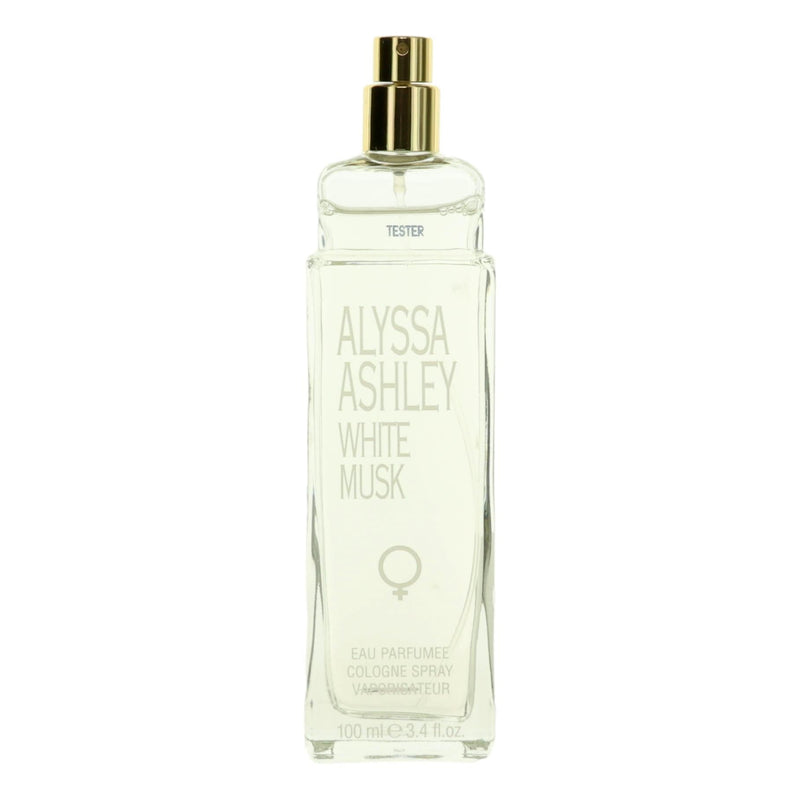 A woman holding a 3.4 oz bottle of Alyssa Ashley White Musk EDT Spray for women, product label clearly visible.
